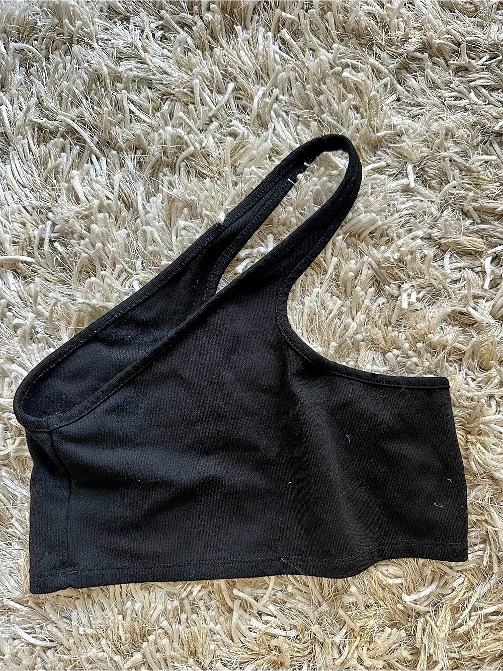 Sleek black crossbody crop top